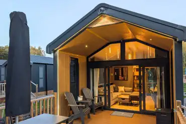 Superior glamping cabins with an outdoor decking area