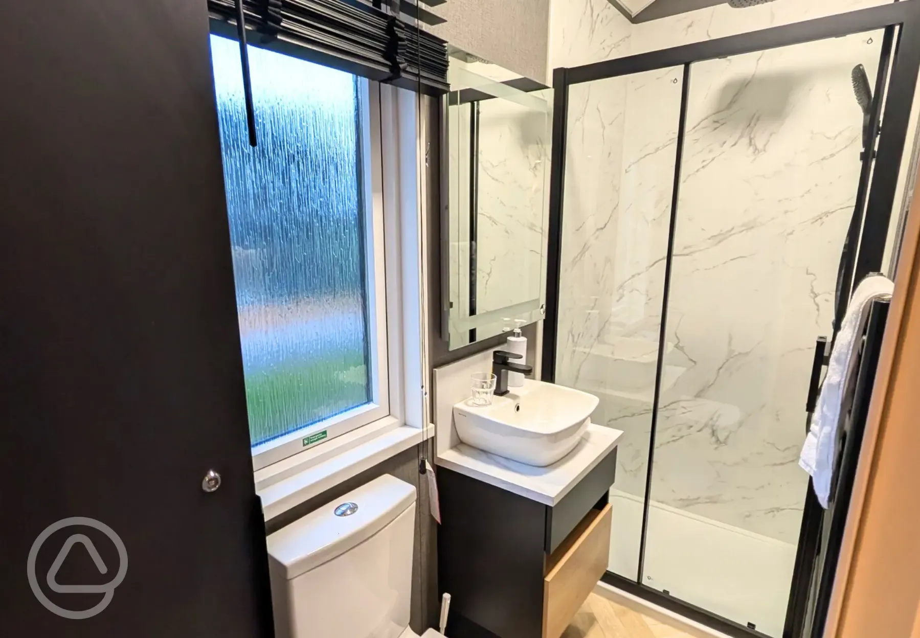 Superior glamping cabin ensuite bathroom (towels not provided but can be hired)