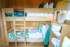Deluxe safari tent bunk bedroom with bedding provided