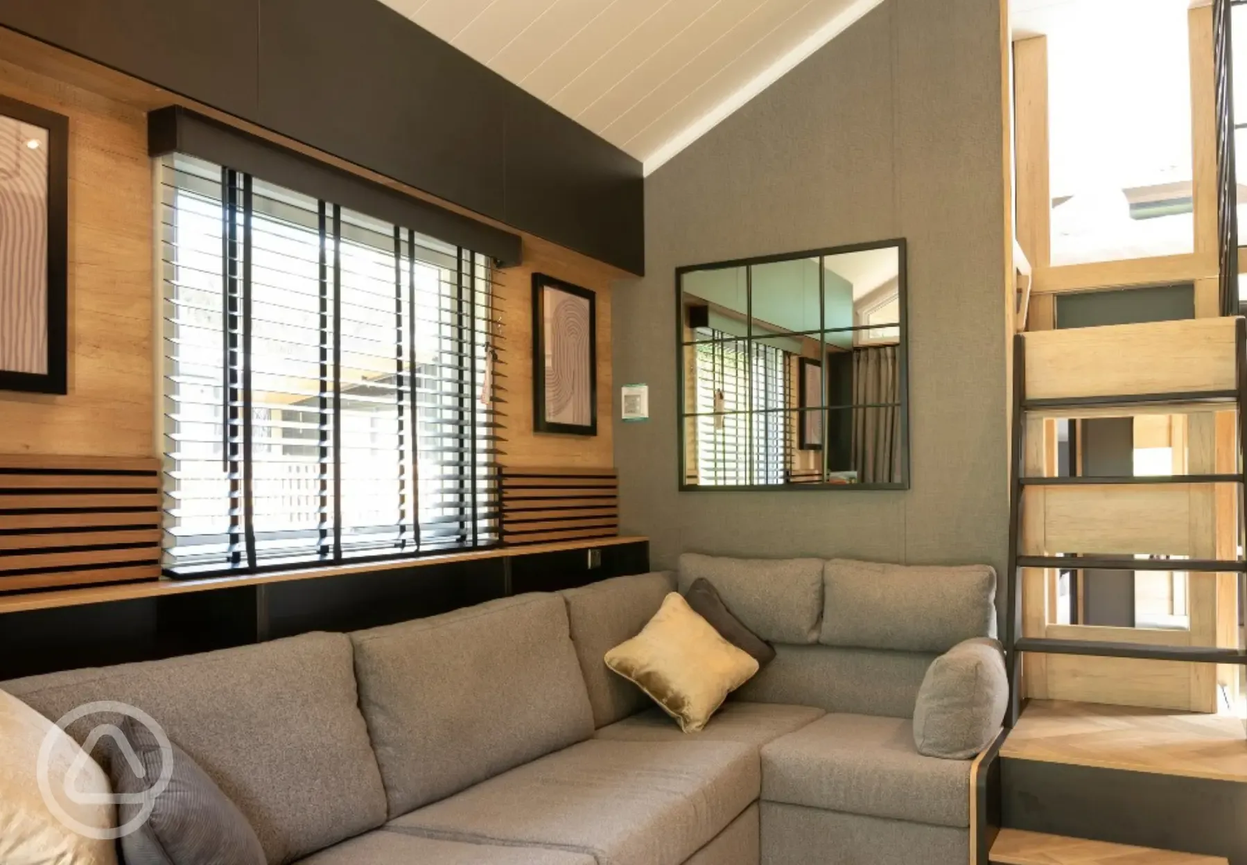 Superior glamping cabin with a double sofa bed