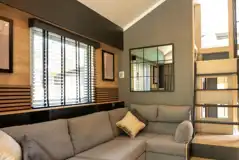 Superior glamping cabin with a double sofa bed