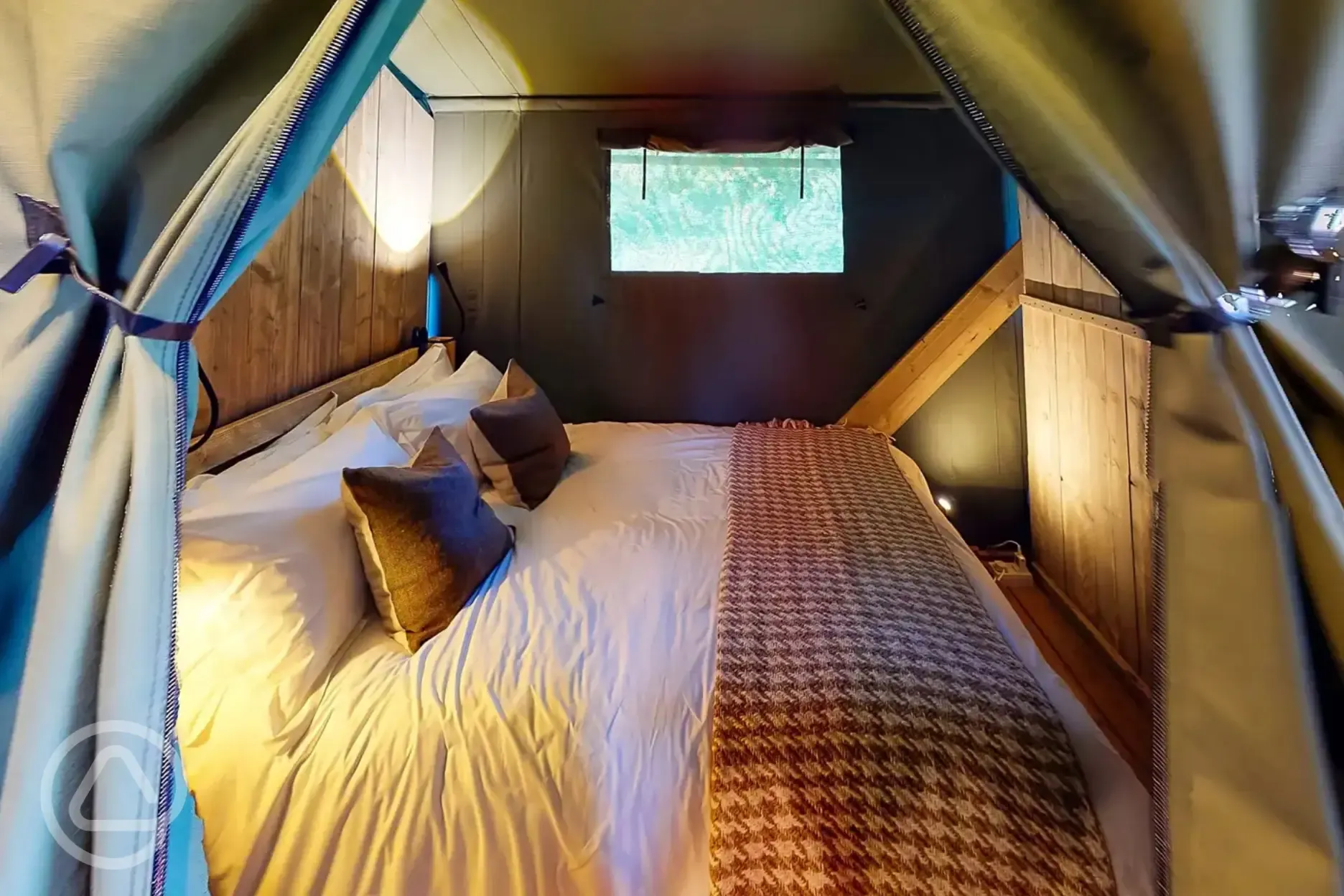 Large Deluxe safari tent with a double bedroom with bedding provided