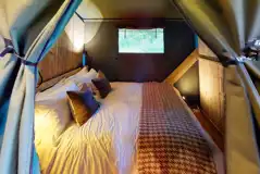 Large Deluxe safari tent with a double bedroom with bedding provided