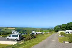 Dartmouth Caravan Park mix of grass and hardstanding with countryside views