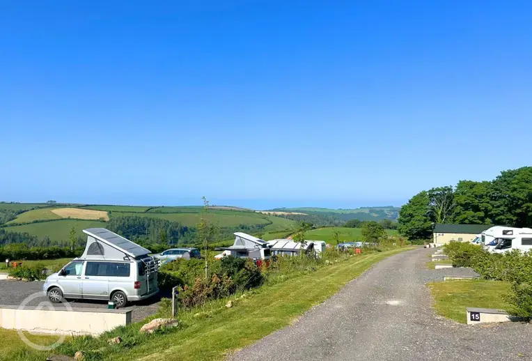 Dartmouth Caravan Park mix of grass and hardstanding with countryside views