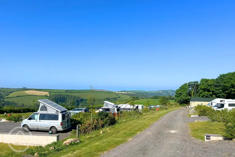 Dartmouth Caravan Park mix of grass and hardstanding with countryside views