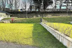 Grass (12m x 7m) pitches with optional 16 amp hook ups