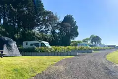 Grass (12m x 7m) pitches with optional 16 amp hook ups