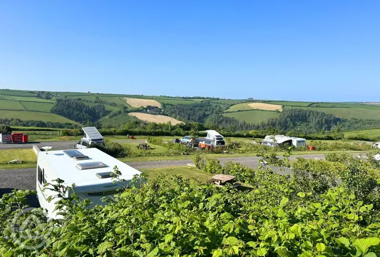 Dartmouth Caravan Park mix of grass and hardstanding with countryside views