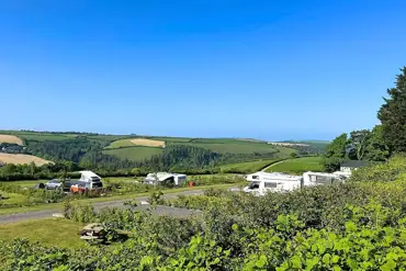 Dartmouth Caravan Park mix of grass and hardstanding with countryside views