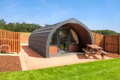 Glamping pod and picnic bench at Tweedbraes Glamping - Paxton House