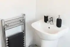 Ensuite wetroom with a toilet, shower, hand basin and two shower heads Ensuite wetroom with a toilet, shower, hand basin and two shower heads