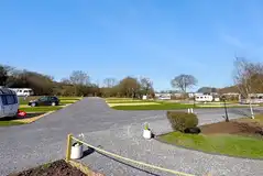 Electric hardstanding and grass pitches (8m x 5m)