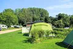 Grass pitches with 16 amp hook ups, water, grey waste, WiFi and TV points