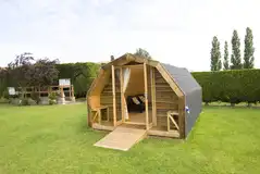 Camping pod with double glass doors and two single sofa beds