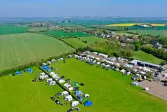Aerial of Top End Farm with farm buildings and an onsite shop Aerial of Top End Farm with farm buildings and an onsite shop