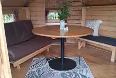 Wooden eco house interior (please bring camping equipment minus the tent)