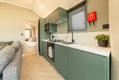 Cabin kitchen with a dishwasher, hob, microwave, fridge, toaster and air fryer Cabin kitchen with a dishwasher, hob, microwave, fridge, toaster and air fryer