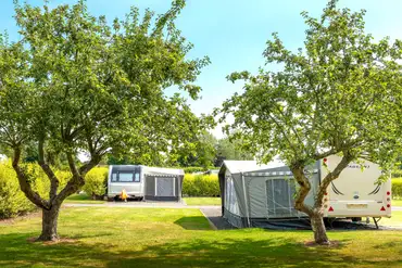 Hardstanding pitches with electric, water, grey waste and a TV aerial