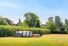 Electric grass tent pitches (5m x 10m) with 16 amp hook ups