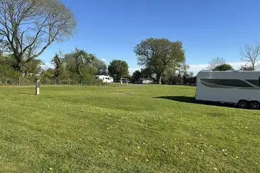 Grass pitches with optional 16 amp electric