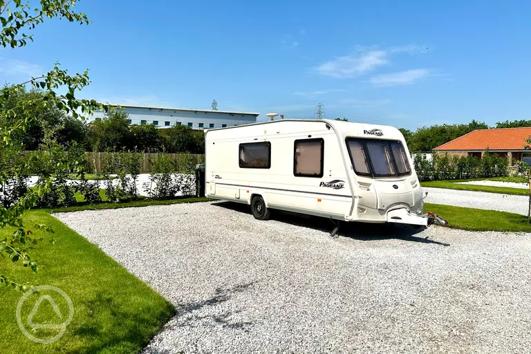 Electric gravel and grass pitches at Holly Tree Nook