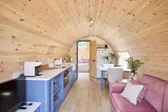 Meadow Spa pod living, dining and kitchen area with a smart TV