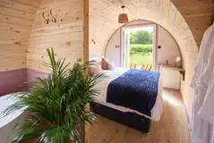 Meadow Spa king size bedroom with a free-standing bath tub