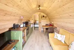 Coppice pod living, dining and kitchen area with a smart TV