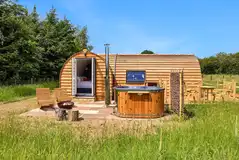Waters Edge with a wood-fired hot tub, fire pit and seating