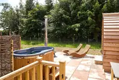 Campion pod wood-fired hot, loungers and patio area