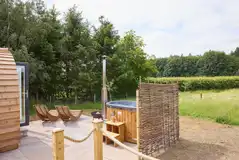 Meadow Spa with a wood-fired hot tub, fire pit and seating