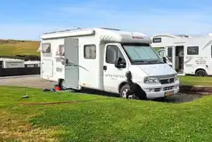 Electric hardstanding and grass pitches with 10 amp electric