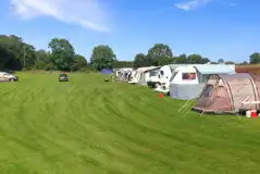 Electric Grass Pitches at Field Farm Fisheries