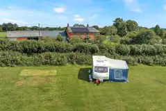 Electric Grass Pitches at Hill Cottage Farm Camping and Caravan Park