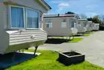 Static Holiday Caravans (Sleep 4) at Chy Carne Camping and Touring Park