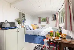 The Shepherd's Hut interior with double bed