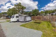 Fully Serviced Hardstanding Pitches (Pine Views) Bench only  at Pinecones Caravan and Camping