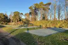 Grass fully serviced pitches (pine views) Grass fully serviced pitches (pine views)