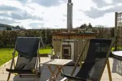 Shepherds hut with hot tub and seating