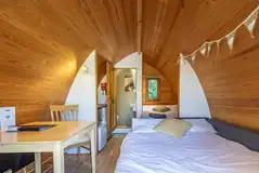 Four person pod with a double bed and double soda bed (bring own bedding)