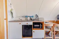 Kitchen with a sink, kettle, toaster, fridge, freezer, hob and combi oven Kitchen with a sink, kettle, toaster, fridge, freezer, hob and combi oven
