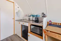 Kitchen with a sink, kettle, toaster, fridge, freezer, hob and combi oven Kitchen with a sink, kettle, toaster, fridge, freezer, hob and combi oven