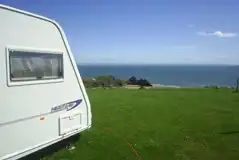 Sea View Electric Hardstanding Pitches at Three Cliffs Bay Holiday Park