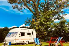 Premium Electric Grass Pitches at Tregroes Caravan, Camping and Glamping Park