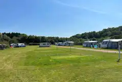 Electric Grass Pitches at Mill House Caravan and Camping Site