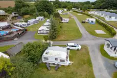 Serviced Grass Touring Pitches at Calloose Holiday Park