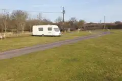 Fully Serviced Grass Pitches at The Oyster Farm Caravan Site