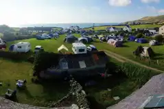 Electric Grass Pitches at Church Bay Cottages Camping and Touring Site