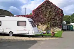 Premium Electric Courtyard Hardstanding Pitch at Sleningford Watermill Caravan and Camping Park